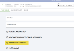 A large clock tower and other buildings line a great river.